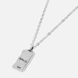 Studio image of silver ring on glossy white background v3
