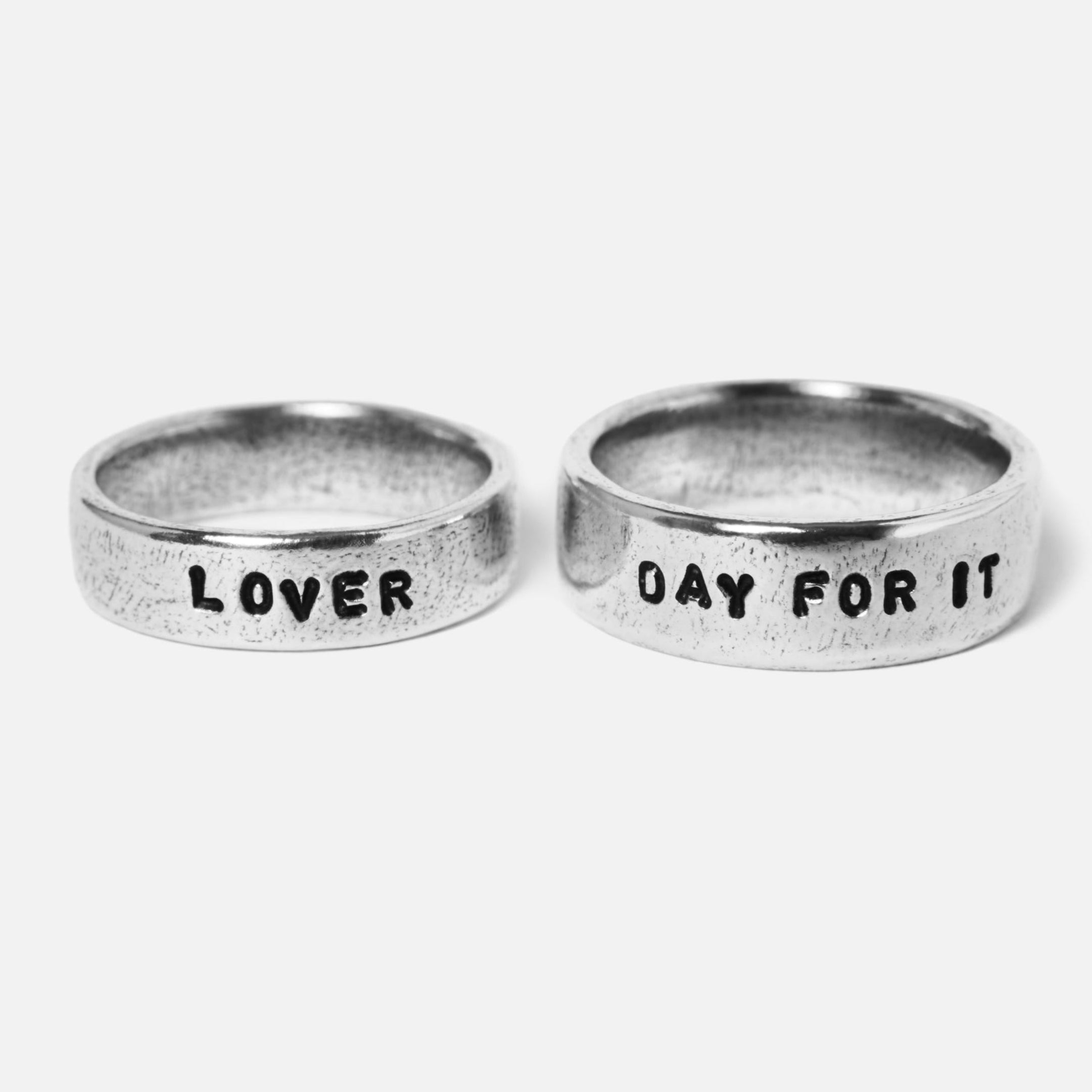 Double coin custom stamp rings displayed on white