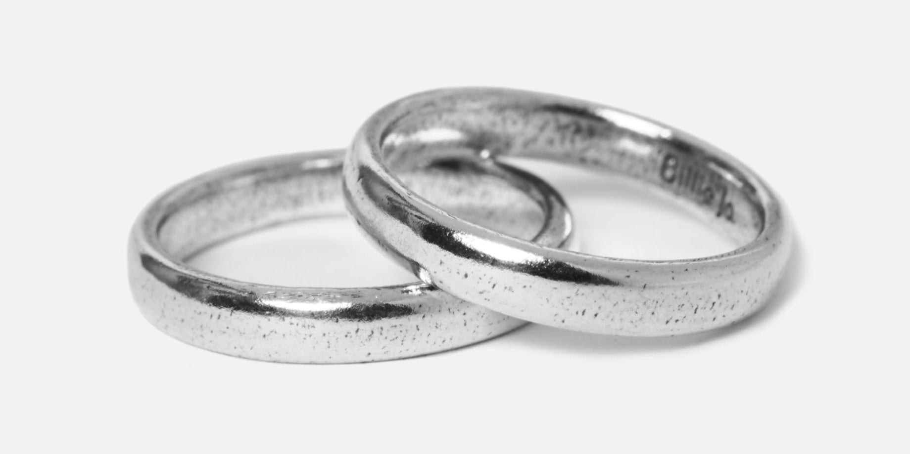 Stackable Billie Jo rings arranged for modern minimalist style.